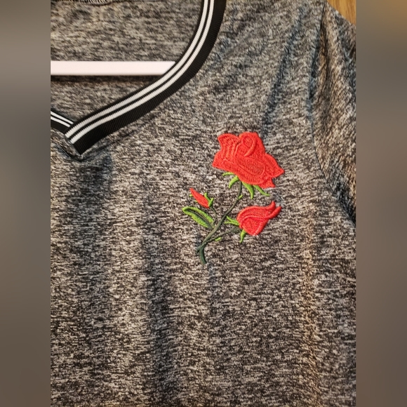 Cute, short sleeve black and gray v-neck shirt with red rose detail on front. - Picture 2 of 4